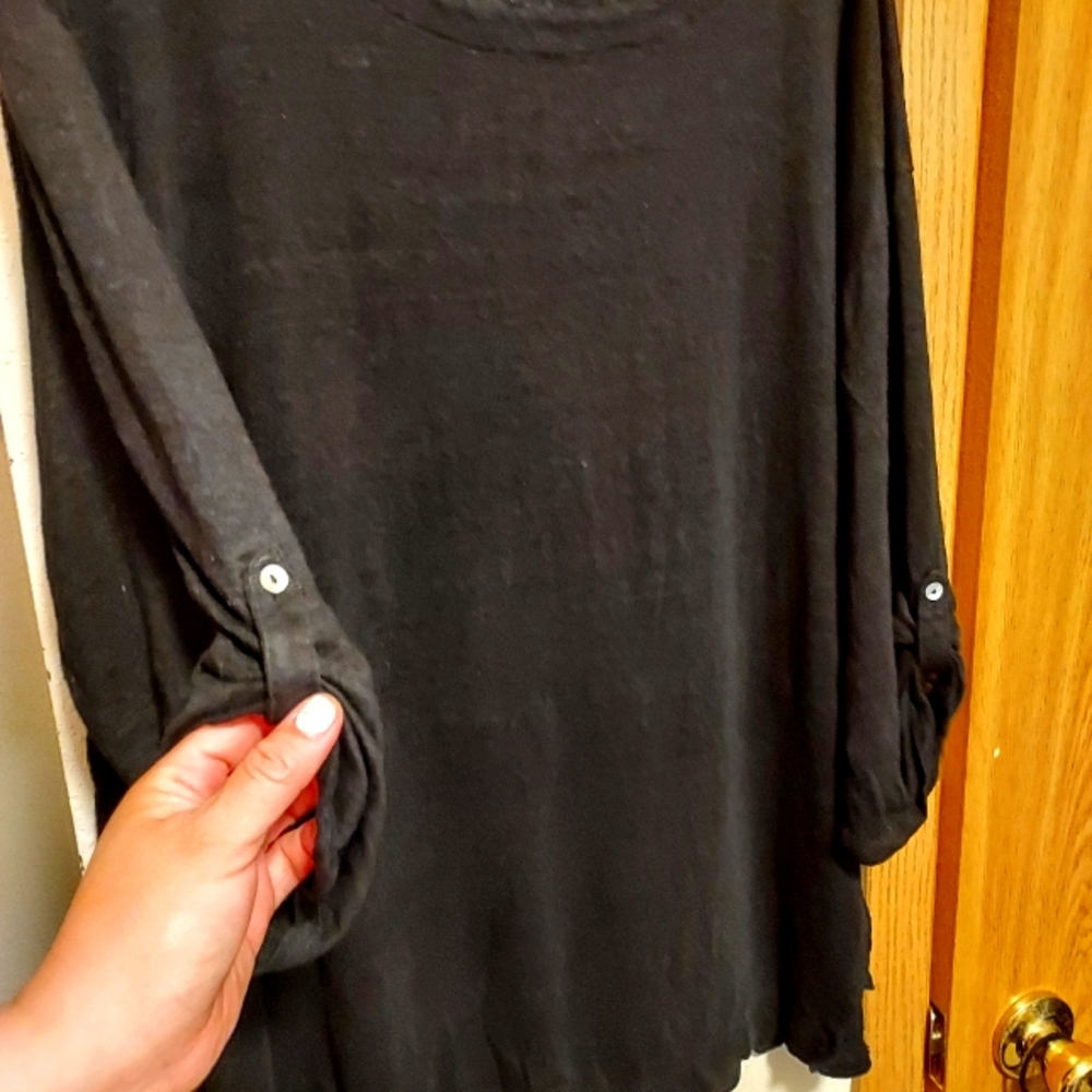 Cute black top with split back.